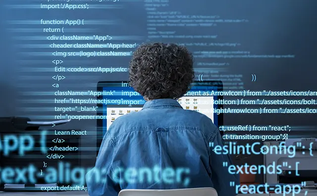 Coder immersed in digital infrastructure development, working on JavaScript and React.js applications.